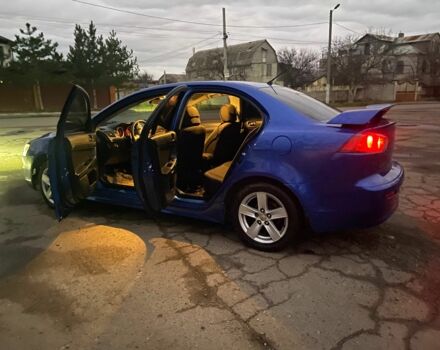 Синий Мицубиси Лансер, объемом двигателя 2 л и пробегом 176 тыс. км за 5300 $, фото 8 на Automoto.ua