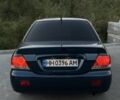 Синий Мицубиси Лансер, объемом двигателя 1.6 л и пробегом 138 тыс. км за 4800 $, фото 10 на Automoto.ua