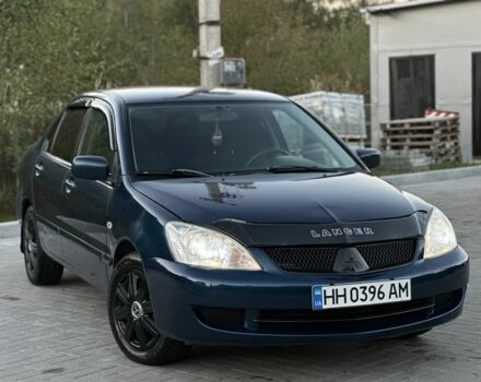 Синий Мицубиси Лансер, объемом двигателя 1.6 л и пробегом 138 тыс. км за 4800 $, фото 6 на Automoto.ua