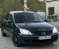 Синий Мицубиси Лансер, объемом двигателя 1.6 л и пробегом 138 тыс. км за 4800 $, фото 6 на Automoto.ua