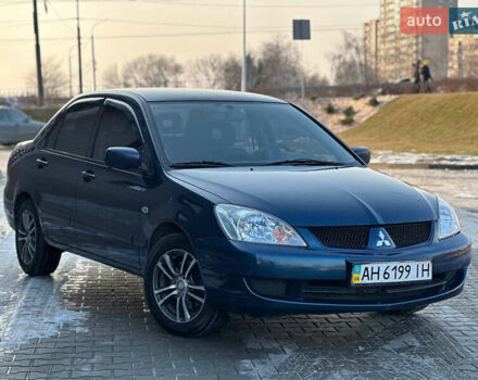 Синій Міцубісі Lancer, об'ємом двигуна 1.6 л та пробігом 250 тис. км за 5499 $, фото 1 на Automoto.ua