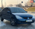 Синій Міцубісі Lancer, об'ємом двигуна 1.6 л та пробігом 250 тис. км за 5499 $, фото 1 на Automoto.ua