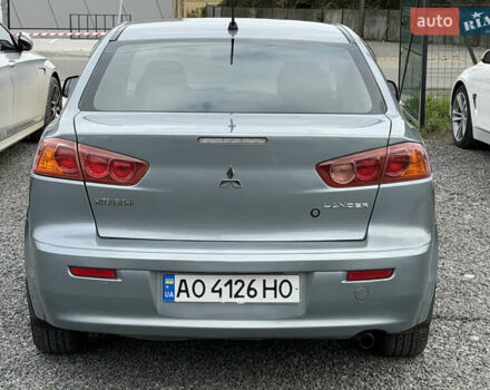 Міцубісі Lancer 2009 у Ужгороді на Automoto.ua Синій Міцубісі Lancer, об'ємом двигуна 2 л та пробігом 320 тис. км за 4999 $, фото 5 на Automoto.ua