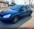 Синий Мицубиси Лансер, объемом двигателя 1.6 л и пробегом 250 тыс. км за 4999 $, фото 3 на Automoto.ua