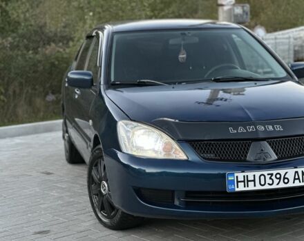 Синий Мицубиси Лансер, объемом двигателя 1.6 л и пробегом 138 тыс. км за 4800 $, фото 5 на Automoto.ua