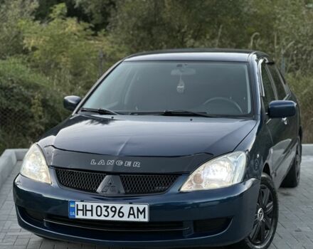 Синий Мицубиси Лансер, объемом двигателя 1.6 л и пробегом 138 тыс. км за 4800 $, фото 1 на Automoto.ua
