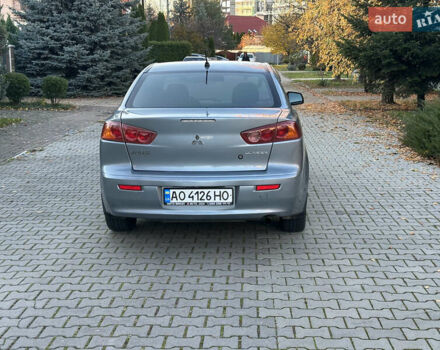 Синий Мицубиси Лансер, объемом двигателя 2 л и пробегом 320 тыс. км за 4999 $, фото 4 на Automoto.ua