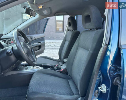 Синій Міцубісі Lancer, об'ємом двигуна 1.6 л та пробігом 250 тис. км за 5499 $, фото 11 на Automoto.ua