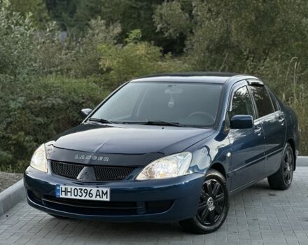 Синий Мицубиси Лансер, объемом двигателя 1.6 л и пробегом 138 тыс. км за 4800 $, фото 2 на Automoto.ua