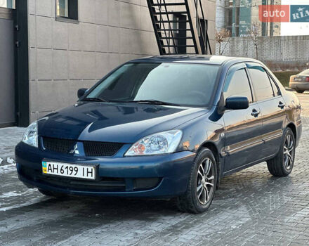 Синій Міцубісі Lancer, об'ємом двигуна 1.6 л та пробігом 250 тис. км за 5499 $, фото 3 на Automoto.ua