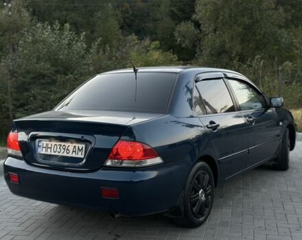 Синий Мицубиси Лансер, объемом двигателя 1.6 л и пробегом 138 тыс. км за 4800 $, фото 8 на Automoto.ua