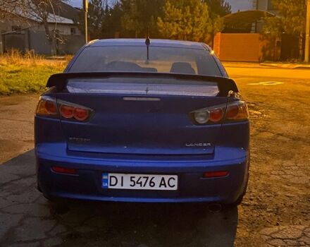 Синий Мицубиси Лансер, объемом двигателя 2 л и пробегом 176 тыс. км за 5300 $, фото 4 на Automoto.ua