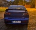 Синий Мицубиси Лансер, объемом двигателя 2 л и пробегом 176 тыс. км за 5300 $, фото 4 на Automoto.ua