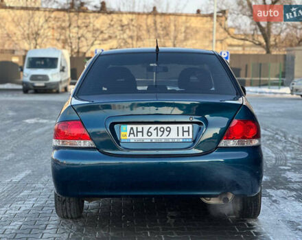 Синій Міцубісі Lancer, об'ємом двигуна 1.6 л та пробігом 250 тис. км за 5499 $, фото 7 на Automoto.ua