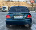 Синій Міцубісі Lancer, об'ємом двигуна 1.6 л та пробігом 250 тис. км за 5499 $, фото 7 на Automoto.ua