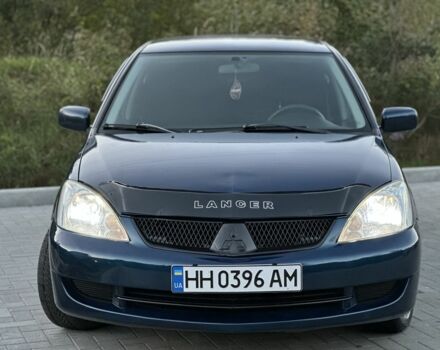 Синий Мицубиси Лансер, объемом двигателя 1.6 л и пробегом 138 тыс. км за 4800 $, фото 3 на Automoto.ua