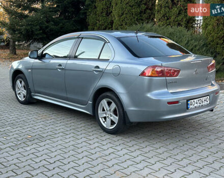 Синий Мицубиси Лансер, объемом двигателя 2 л и пробегом 320 тыс. км за 4999 $, фото 3 на Automoto.ua