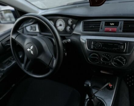 Синий Мицубиси Лансер, объемом двигателя 1.6 л и пробегом 138 тыс. км за 4800 $, фото 16 на Automoto.ua