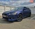 Синій Міцубісі Lancer, об'ємом двигуна 2 л та пробігом 267 тис. км за 5999 $, фото 1 на Automoto.ua