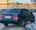 Синій Міцубісі Lancer, об'ємом двигуна 1.6 л та пробігом 250 тис. км за 5499 $, фото 8 на Automoto.ua