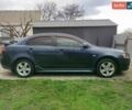 Синій Міцубісі Lancer, об'ємом двигуна 2 л та пробігом 205 тис. км за 6799 $, фото 3 на Automoto.ua