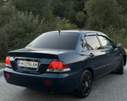 Синий Мицубиси Лансер, объемом двигателя 1.6 л и пробегом 138 тыс. км за 4800 $, фото 9 на Automoto.ua