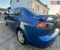 Синий Мицубиси Лансер, объемом двигателя 2 л и пробегом 220 тыс. км за 6000 $, фото 34 на Automoto.ua
