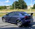Синий Мицубиси Лансер, объемом двигателя 2 л и пробегом 239 тыс. км за 6500 $, фото 9 на Automoto.ua