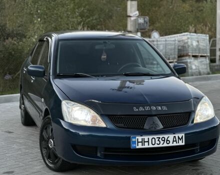 Синий Мицубиси Лансер, объемом двигателя 1.6 л и пробегом 138 тыс. км за 4800 $, фото 4 на Automoto.ua