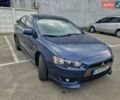 Синій Міцубісі Lancer, об'ємом двигуна 2 л та пробігом 267 тис. км за 5999 $, фото 1 на Automoto.ua