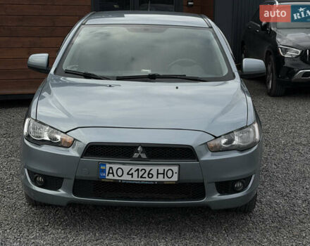 Синий Мицубиси Лансер, объемом двигателя 2 л и пробегом 320 тыс. км за 4900 $, фото 2 на Automoto.ua