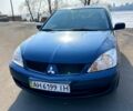 Синий Мицубиси Лансер, объемом двигателя 1.6 л и пробегом 250 тыс. км за 4999 $, фото 1 на Automoto.ua