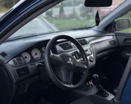 Синий Мицубиси Лансер, объемом двигателя 1.6 л и пробегом 138 тыс. км за 4800 $, фото 11 на Automoto.ua