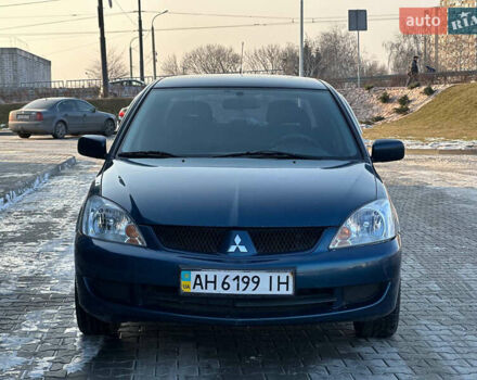 Синій Міцубісі Lancer, об'ємом двигуна 1.6 л та пробігом 250 тис. км за 5499 $, фото 2 на Automoto.ua