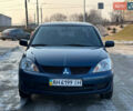 Синій Міцубісі Lancer, об'ємом двигуна 1.6 л та пробігом 250 тис. км за 5499 $, фото 2 на Automoto.ua