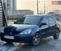Синій Міцубісі Lancer, об'ємом двигуна 1.6 л та пробігом 250 тис. км за 5499 $, фото 1 на Automoto.ua