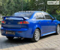 Синій Міцубісі Lancer, об'ємом двигуна 2 л та пробігом 201 тис. км за 7300 $, фото 4 на Automoto.ua