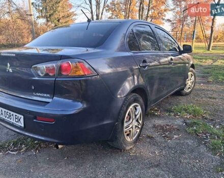 Синий Мицубиси Лансер, объемом двигателя 1.5 л и пробегом 123 тыс. км за 8500 $, фото 4 на Automoto.ua