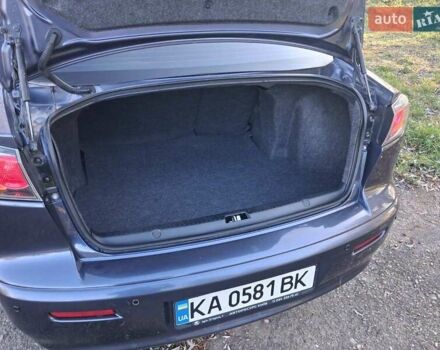 Синий Мицубиси Лансер, объемом двигателя 1.5 л и пробегом 123 тыс. км за 8500 $, фото 10 на Automoto.ua