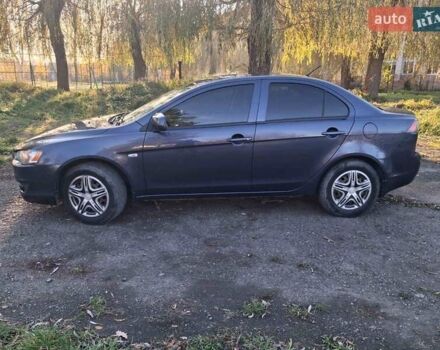 Синий Мицубиси Лансер, объемом двигателя 1.5 л и пробегом 123 тыс. км за 8500 $, фото 2 на Automoto.ua