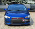 Синій Міцубісі Lancer, об'ємом двигуна 2 л та пробігом 201 тис. км за 7300 $, фото 1 на Automoto.ua