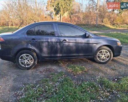 Синий Мицубиси Лансер, объемом двигателя 1.5 л и пробегом 123 тыс. км за 8500 $, фото 5 на Automoto.ua