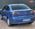 Синий Мицубиси Лансер, объемом двигателя 2 л и пробегом 250 тыс. км за 7699 $, фото 3 на Automoto.ua
