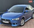Синий Мицубиси Лансер, объемом двигателя 2 л и пробегом 250 тыс. км за 7699 $, фото 1 на Automoto.ua