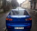 Синий Мицубиси Лансер, объемом двигателя 1.5 л и пробегом 315 тыс. км за 6000 $, фото 1 на Automoto.ua