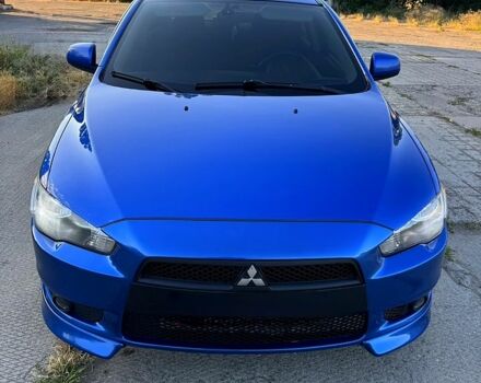 Синий Мицубиси Лансер, объемом двигателя 2 л и пробегом 261 тыс. км за 7300 $, фото 1 на Automoto.ua