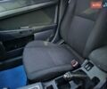 Синий Мицубиси Лансер, объемом двигателя 2 л и пробегом 250 тыс. км за 7699 $, фото 38 на Automoto.ua