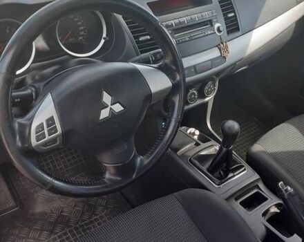 Синій Міцубісі Lancer, об'ємом двигуна 1.5 л та пробігом 92 тис. км за 7000 $, фото 7 на Automoto.ua