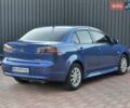 Синий Мицубиси Лансер, объемом двигателя 2 л и пробегом 250 тыс. км за 7699 $, фото 1 на Automoto.ua