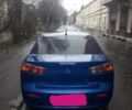 Синий Мицубиси Лансер, объемом двигателя 1.5 л и пробегом 315 тыс. км за 6000 $, фото 1 на Automoto.ua